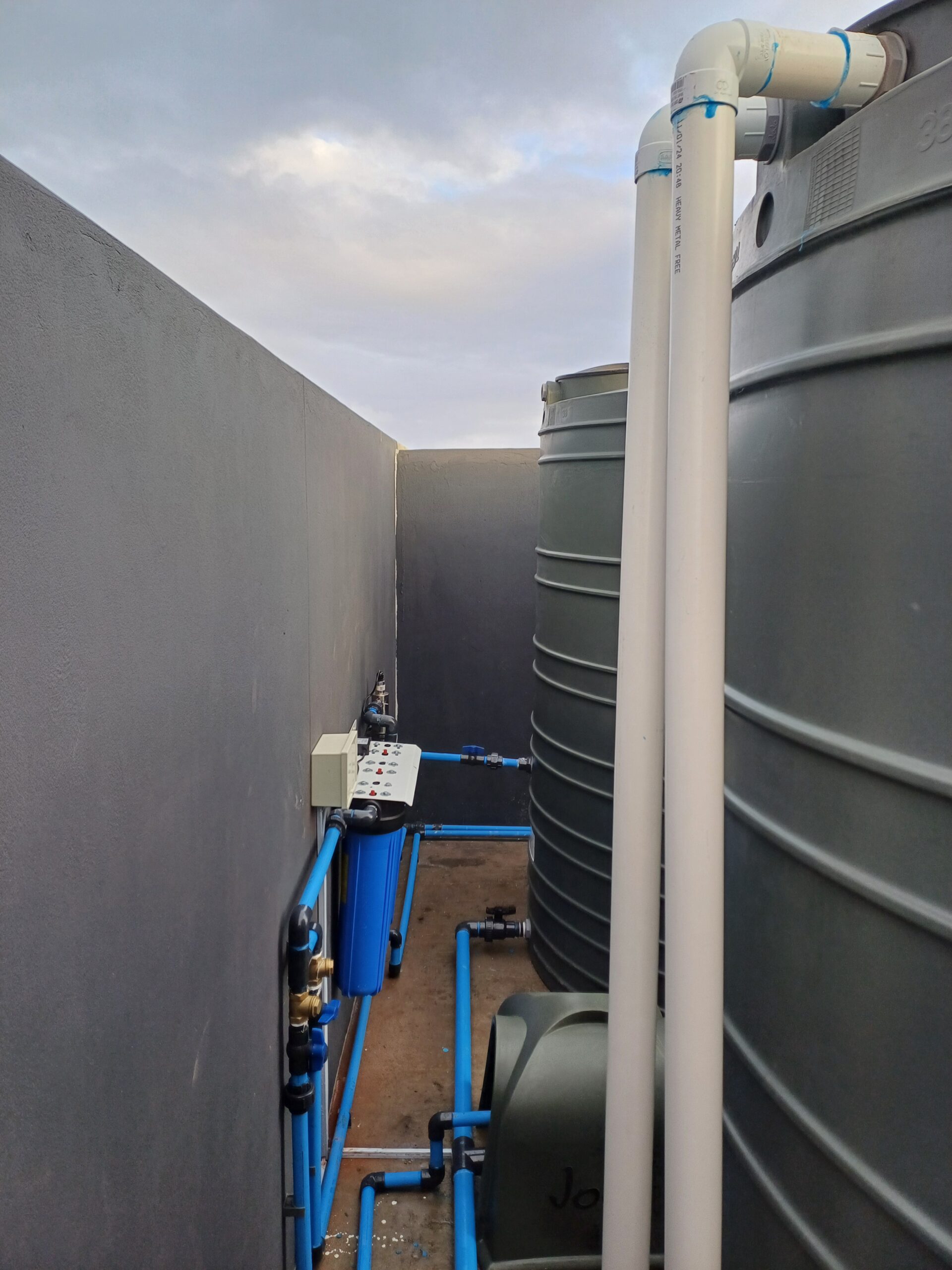 municipal backup and rainwater harvesting system